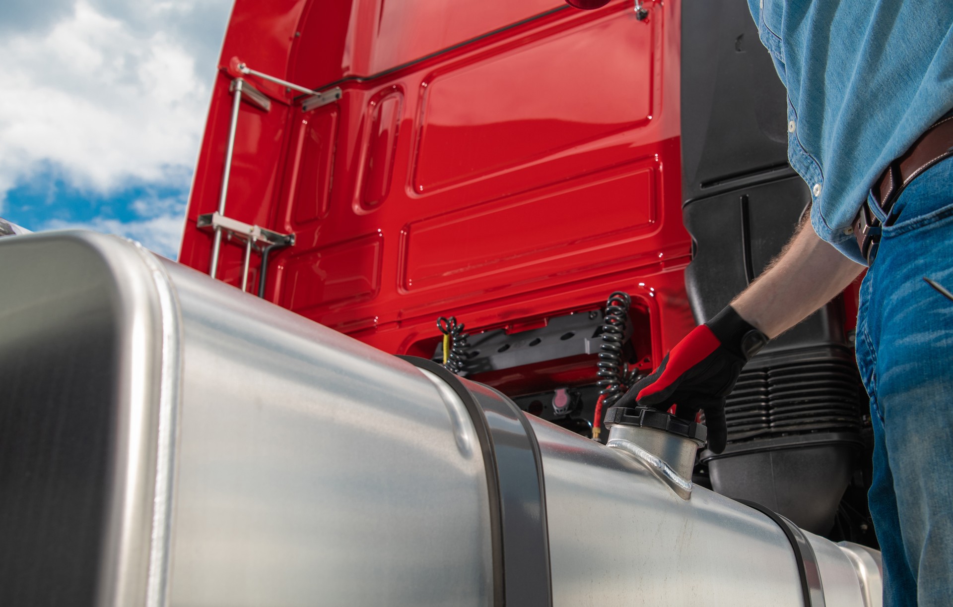 Semi Truck Driver Refueling His Tractor